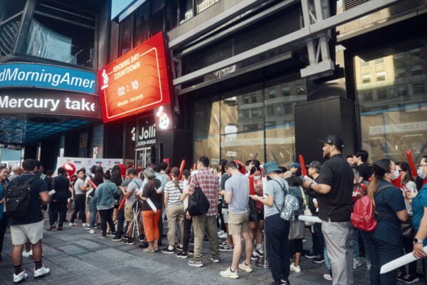 Longtime and new fans  line up in anticipation of the Jollibee Times Square grand opening.